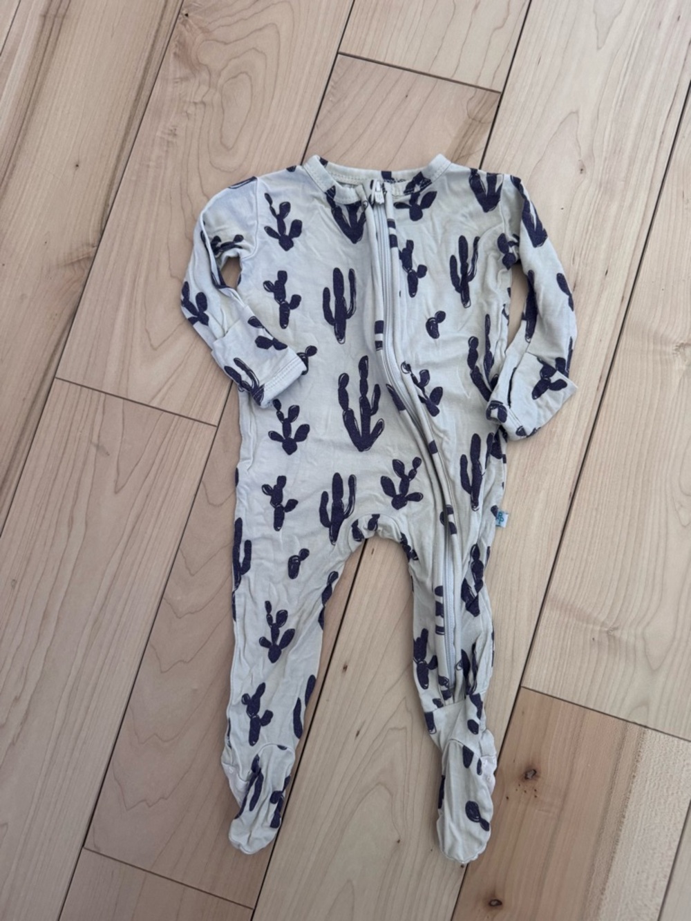 Posh Peanut Cream Footed One-Piece with Navy Cactus Print